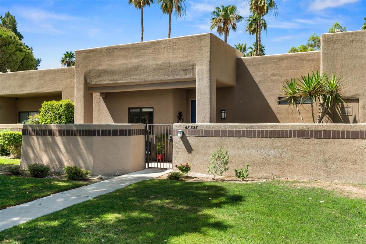 67527 North Portales Drive Cathedral City, CA 92234 - Photo 26 of 47 a view of a house with a garden