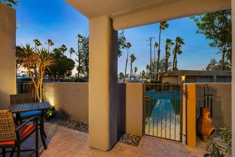 a view of a house with patio outdoor seating space