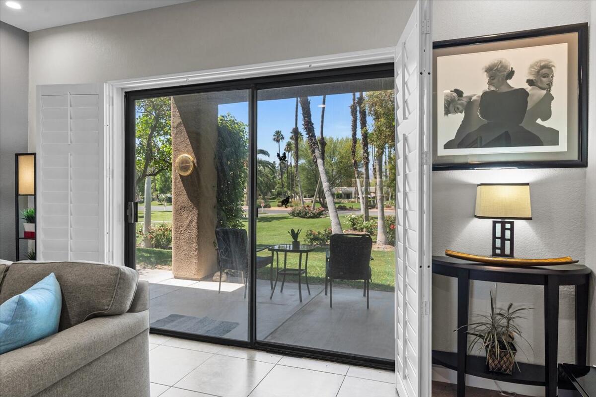 67527 North Portales Drive Cathedral City, CA 92234 - Photo 7 of 47 a living room with furniture and a large window