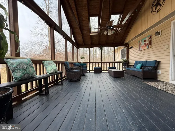 a view of a house with backyard and entertaining space