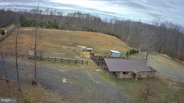 a kitchen with stainless steel appliances granite countertop a stove oven and a refrigerator