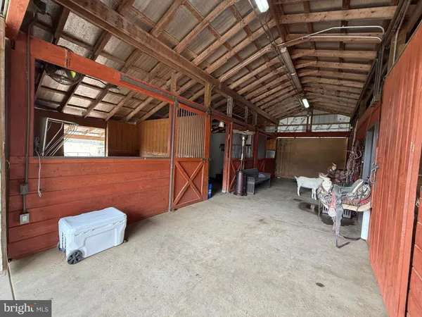 a bathroom with a double vanity sink mirror and toilet