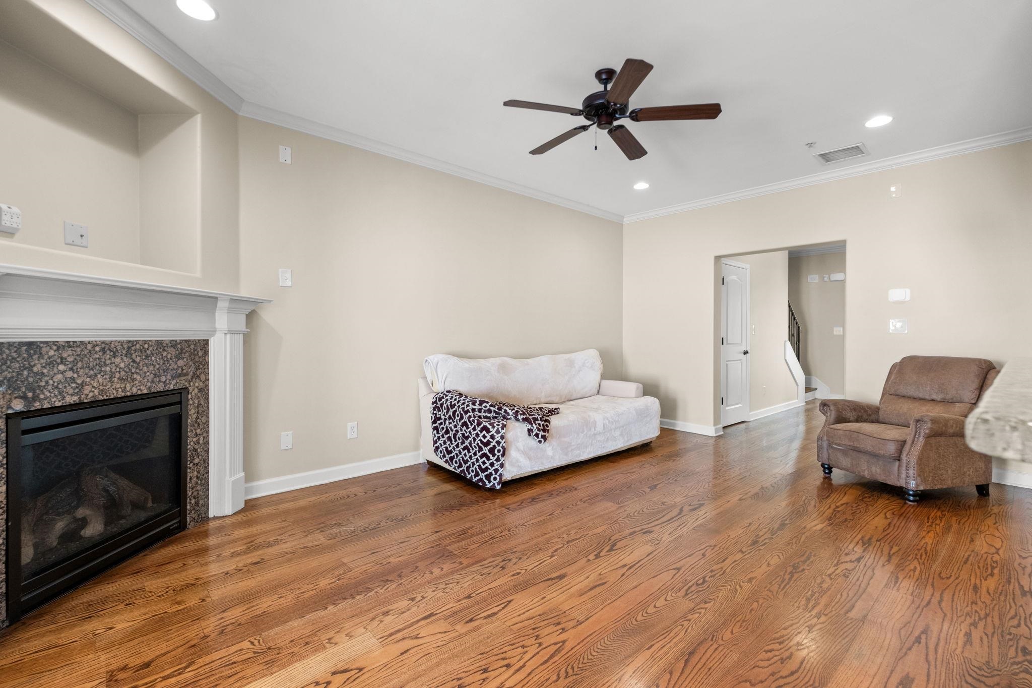 2275 McVay Road, Unit 2275 Germantown, TN 38138 - Photo 10 of 40 a living room with furniture and a fireplace