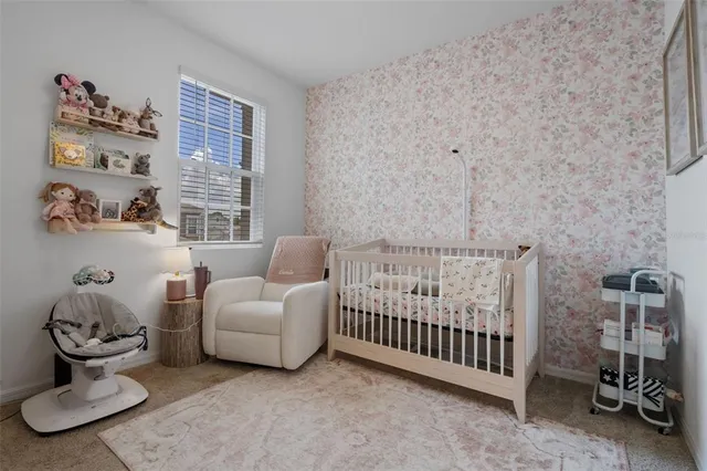 a view of a livingroom with furniture and a window