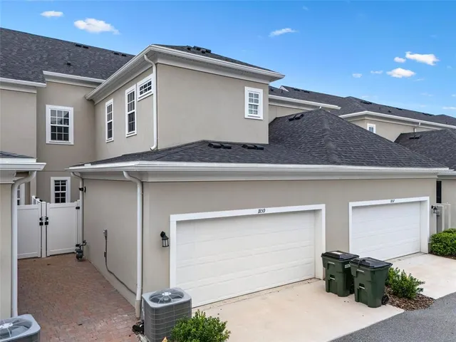 a front view of a house with garage