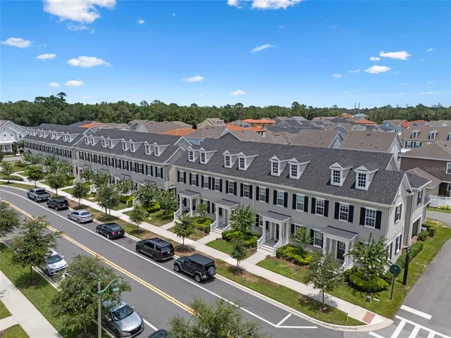 a view of a city with tall buildings