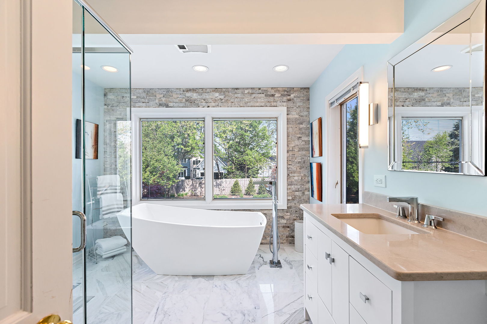 N543 Herrick Drive Wheaton, IL 60187 - Photo 16 of 29 a bathroom with a granite countertop sink and a large mirror