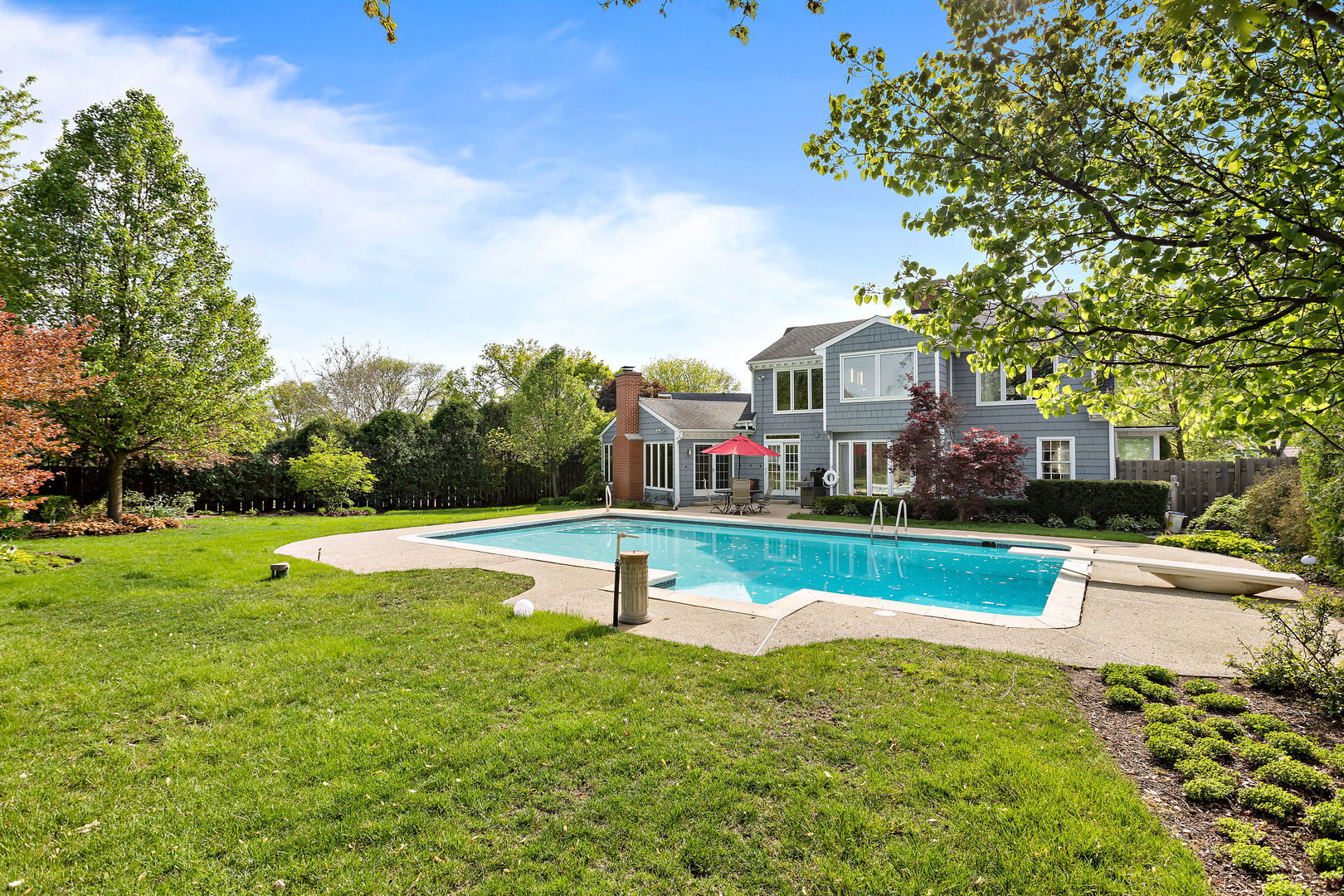 N543 Herrick Drive Wheaton, IL 60187 - Photo 23 of 29 a view of a house with a big yard