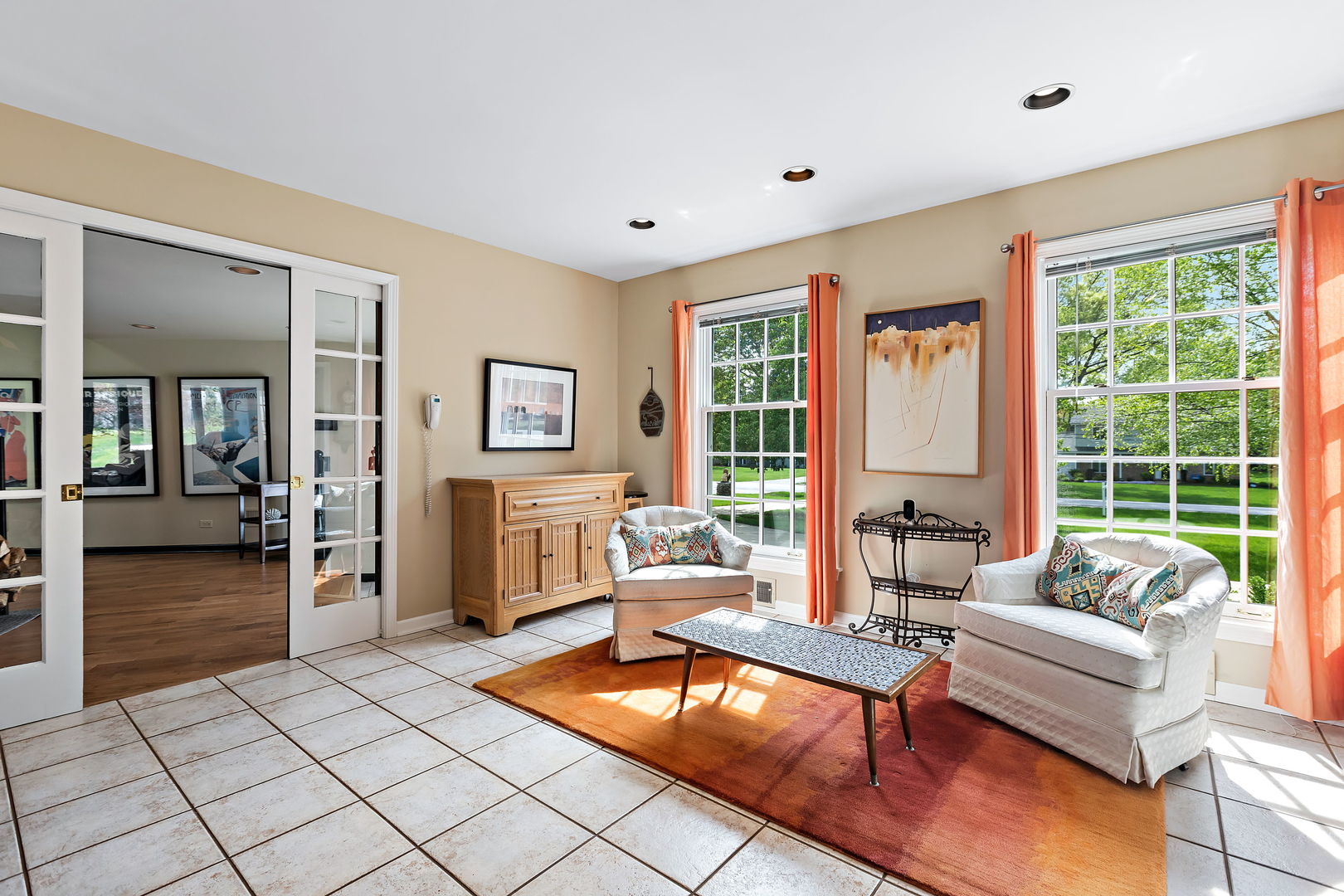 N543 Herrick Drive Wheaton, IL 60187 - Photo 7 of 29 a living room with furniture and large windows