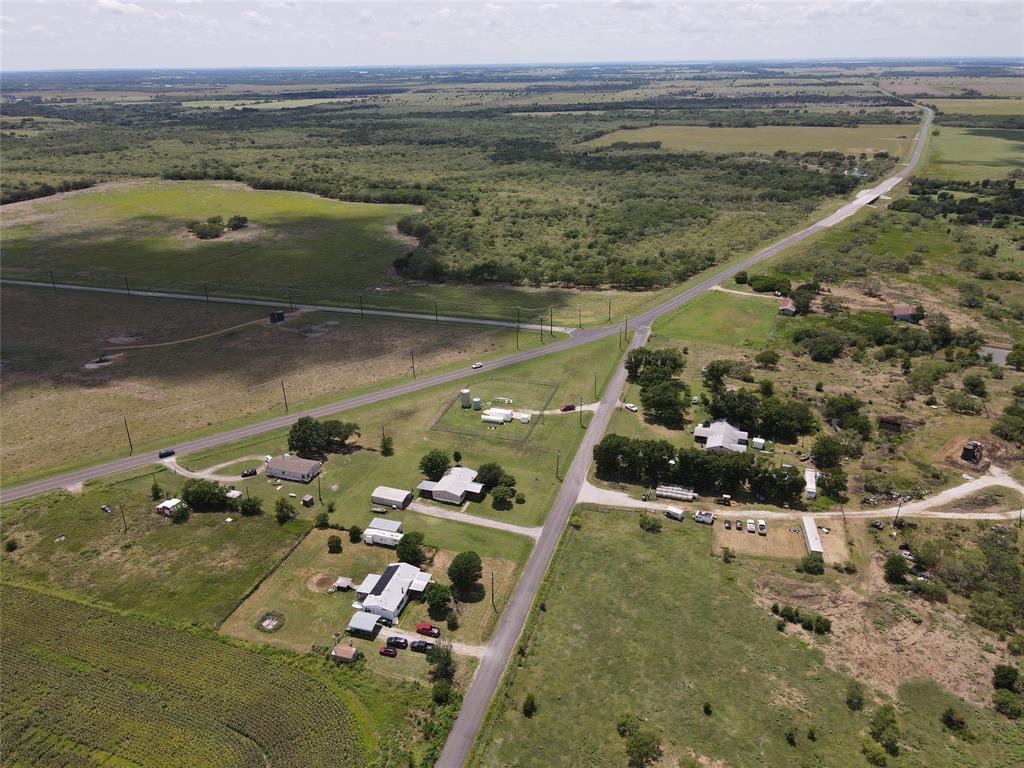 15962 Fritcher Road Pilot Point, TX 76258 - Photo 23 of 24 a view of a lake with a mountain