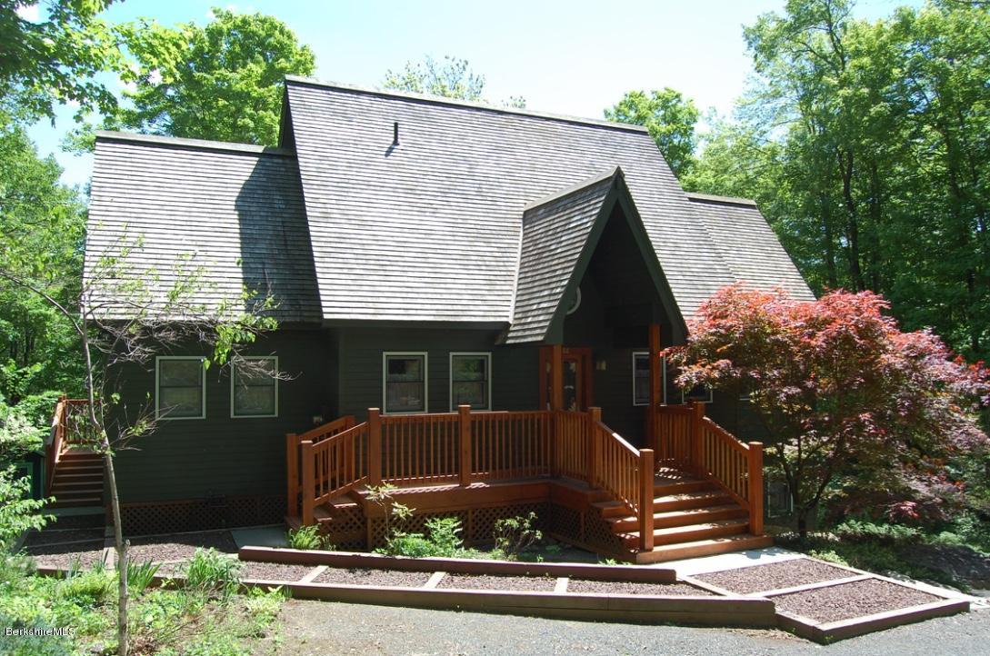 86 Leland Road Becket, MA 01223 - Photo 1 of 37 a view of a house with a yard