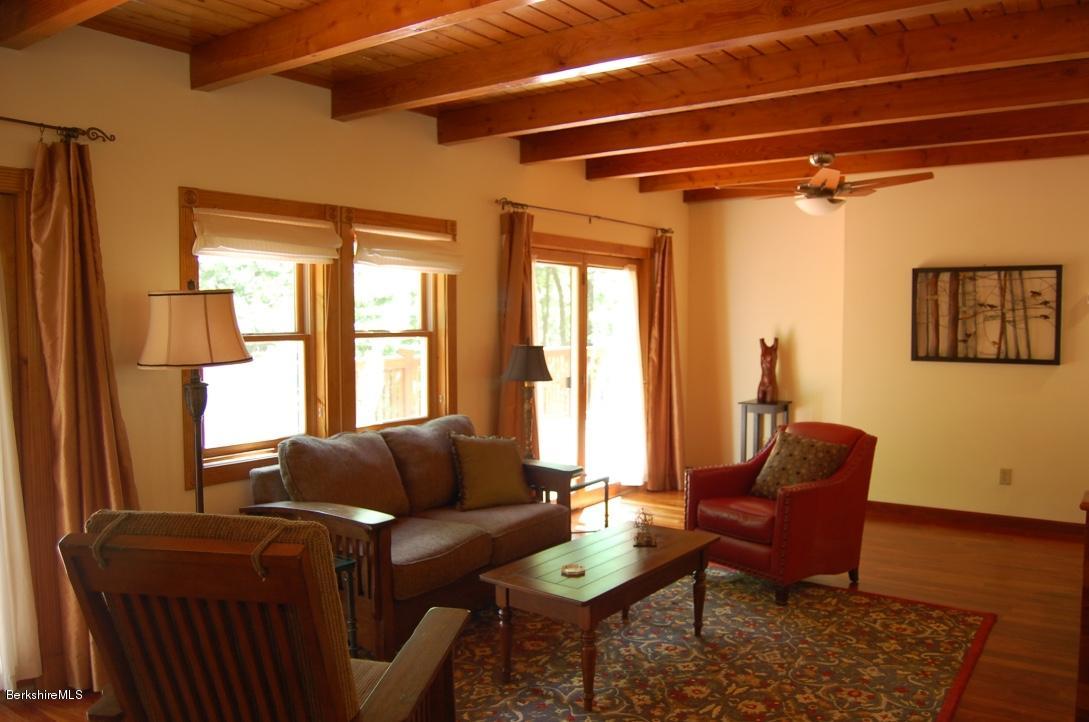 86 Leland Road Becket, MA 01223 - Photo 10 of 37 a living room with furniture and a window