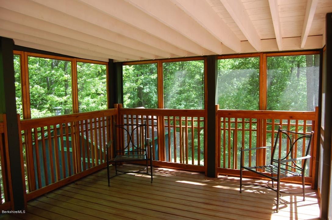 86 Leland Road Becket, MA 01223 - Photo 5 of 37 a view of a balcony with wooden floor