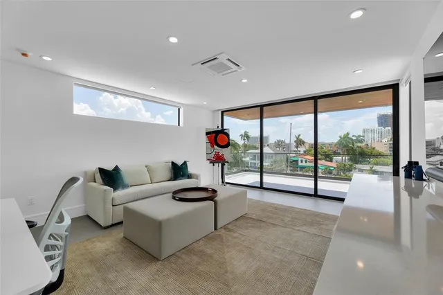 a work room with furniture and a gate