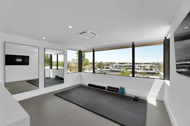 a bed room with a bed and a chair