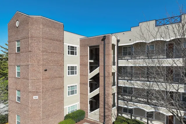 a tall building with a outdoor space