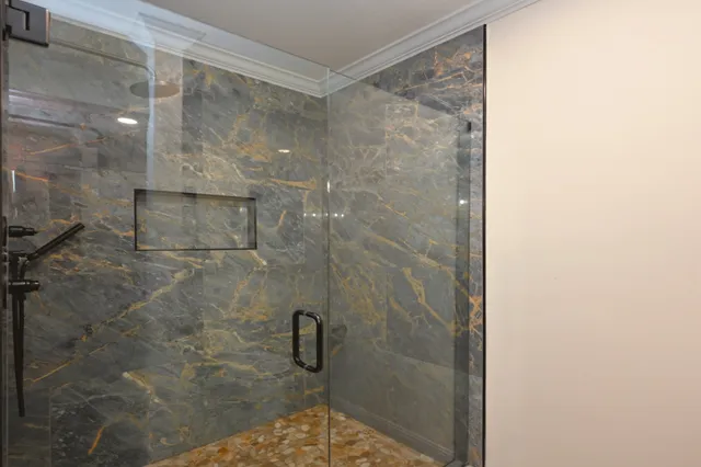 a view of a chairs and table in a patio