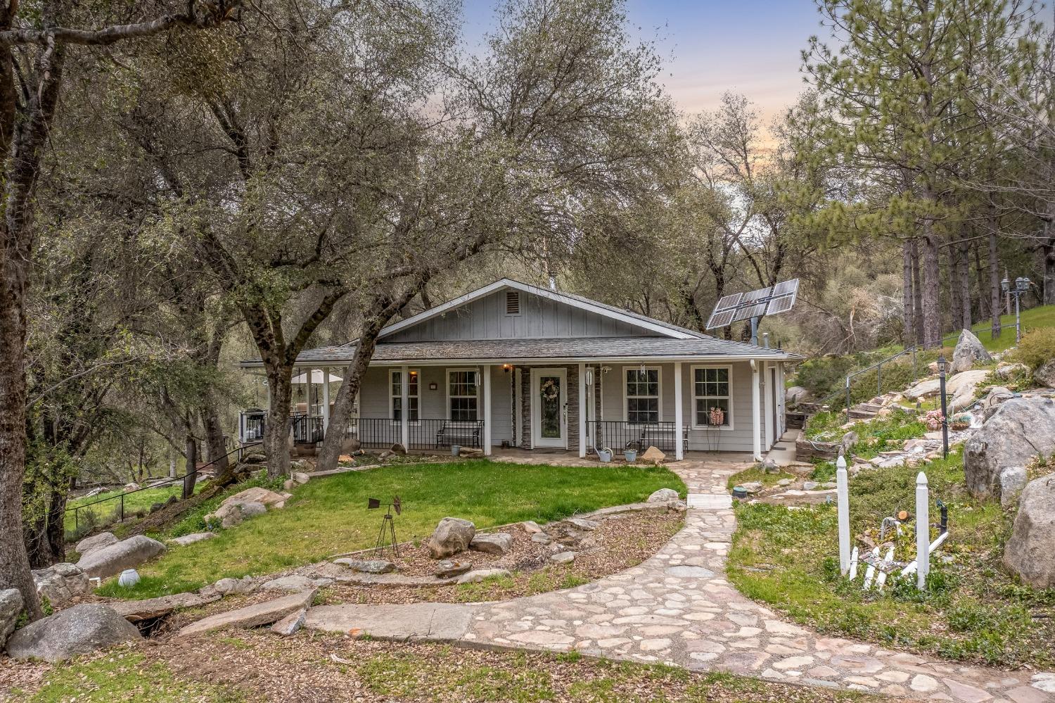 2695 Paso Pass Road Mariposa, CA 95338 - Photo 1 of 56 front view of a house with a yard
