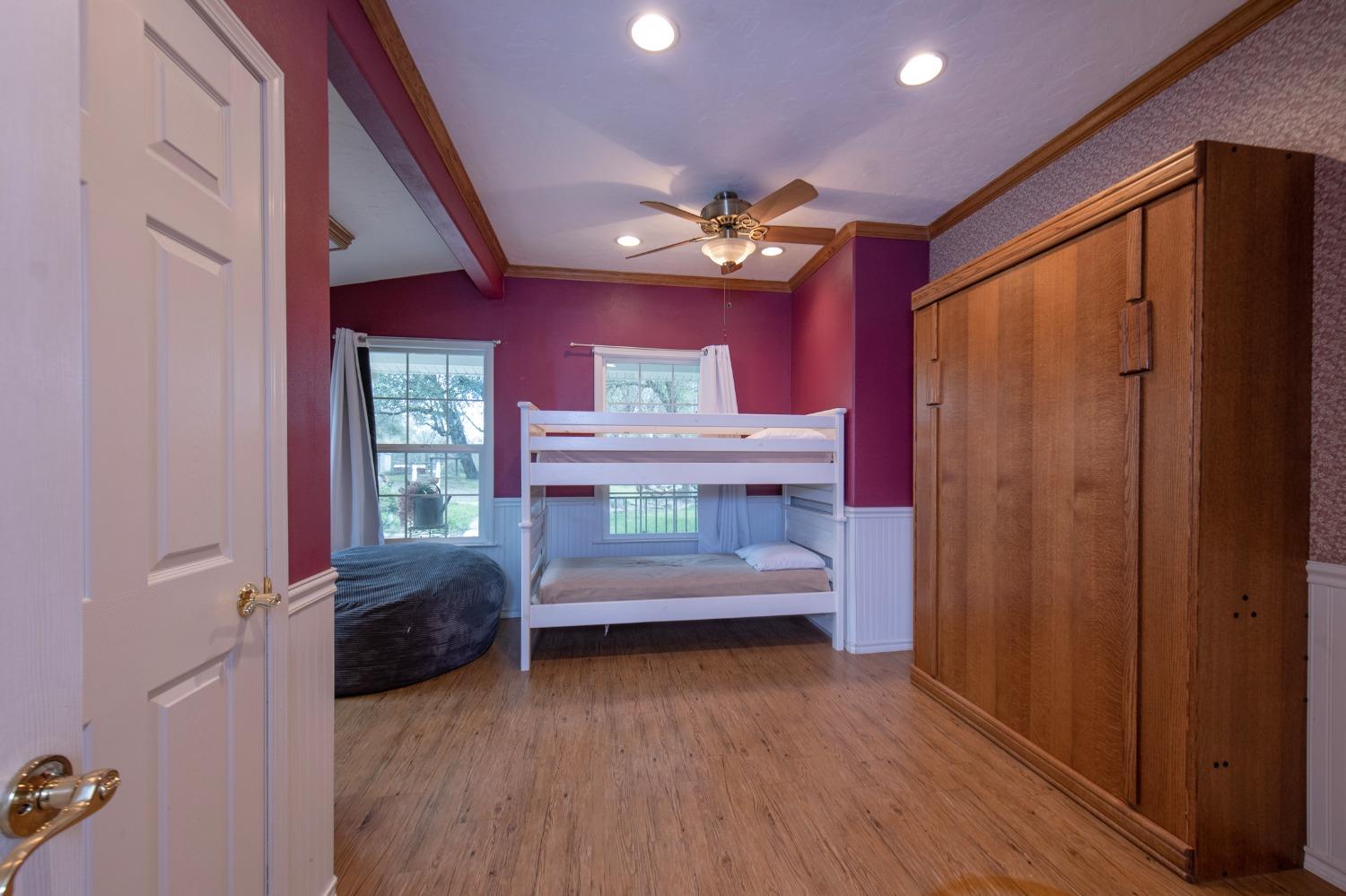 2695 Paso Pass Road Mariposa, CA 95338 - Photo 11 of 56 a bedroom with furniture and a window