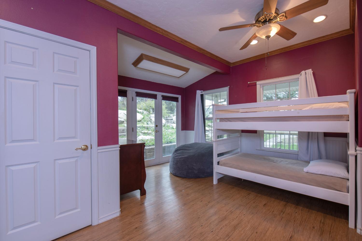 2695 Paso Pass Road Mariposa, CA 95338 - Photo 12 of 56 a living room with a bed furniture and a window