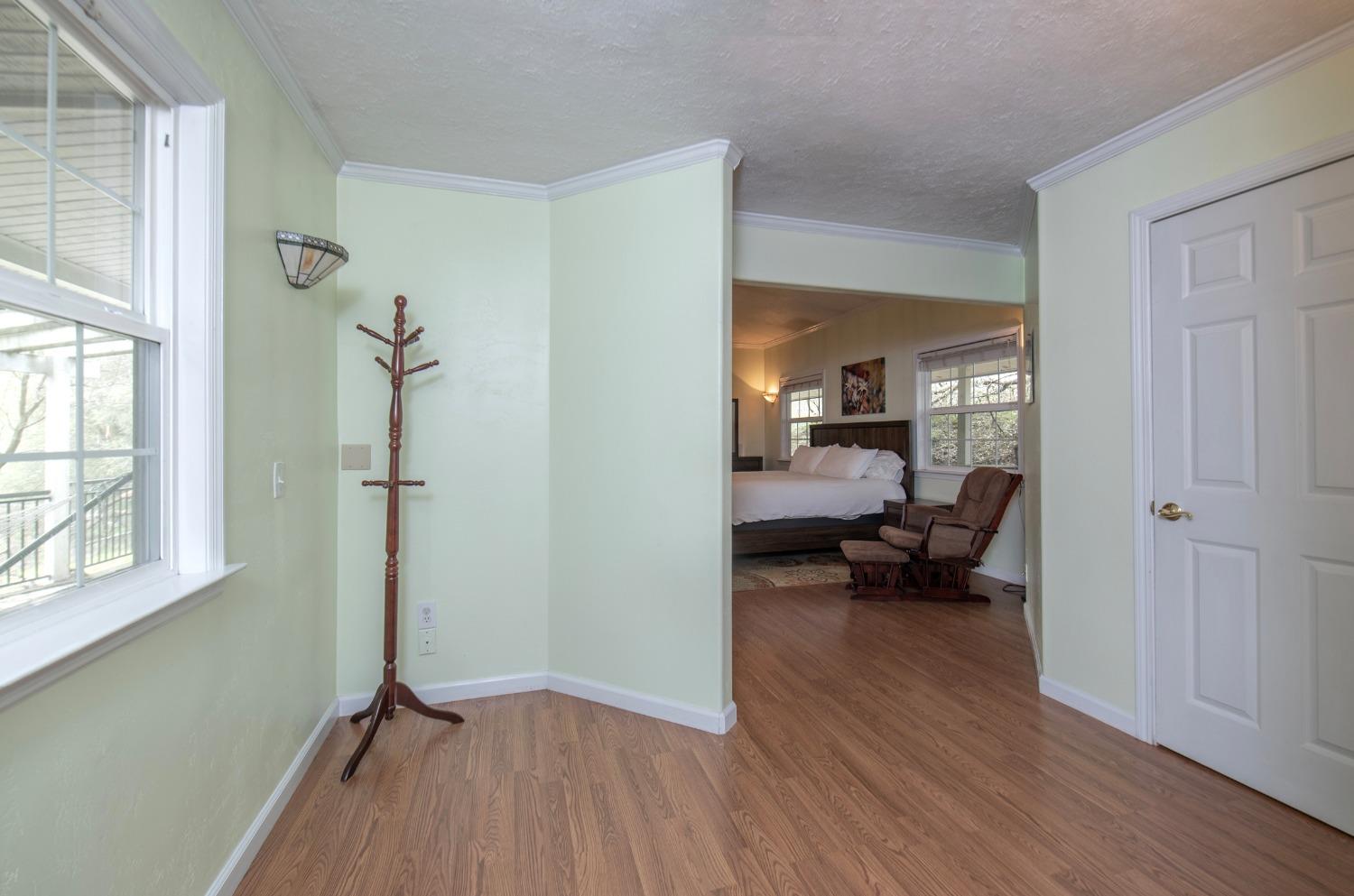 2695 Paso Pass Road Mariposa, CA 95338 - Photo 30 of 56 a view of a livingroom with furniture hardwood floor and a living room