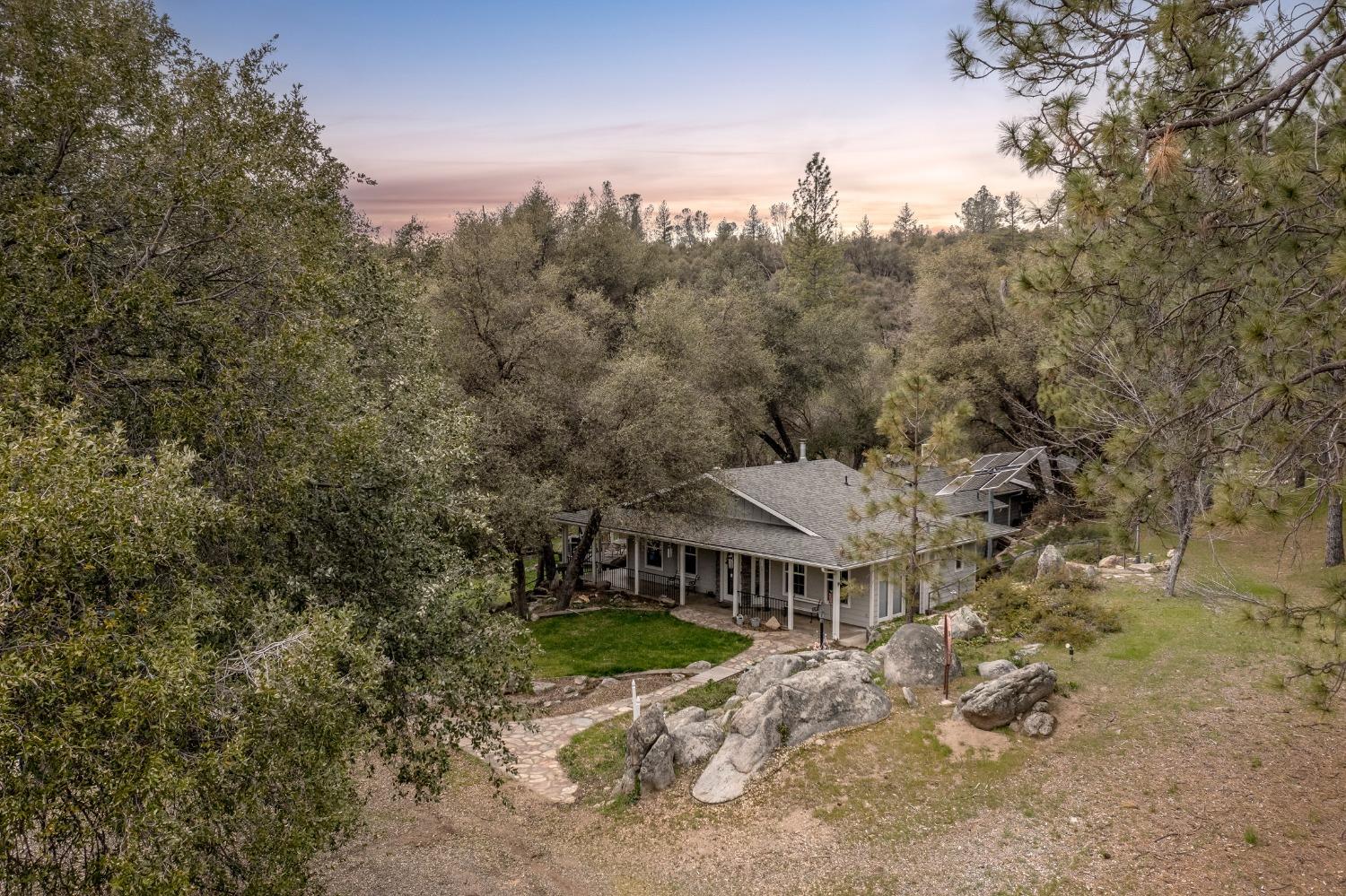 2695 Paso Pass Road Mariposa, CA 95338 - Photo 36 of 56 a view of a house with a yard