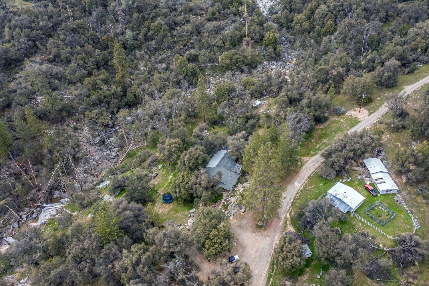 2695 Paso Pass Road Mariposa, CA 95338 - Photo 42 of 56 an aerial view of a house with a yard