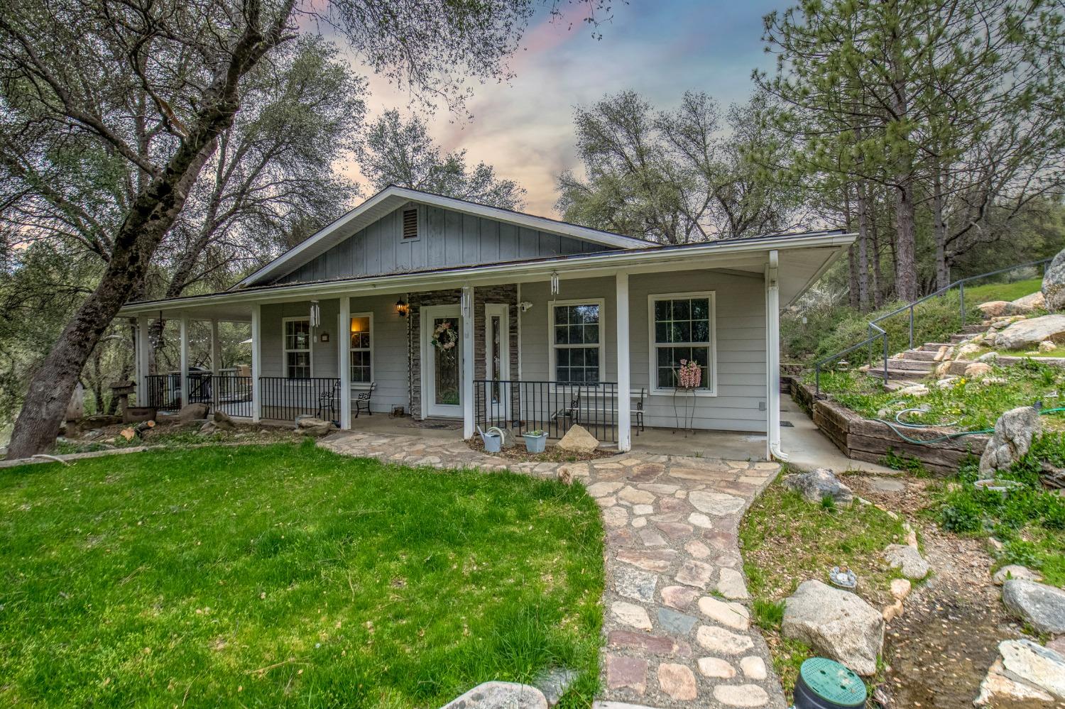 2695 Paso Pass Road Mariposa, CA 95338 - Photo 56 of 56 front view of a house with a yard