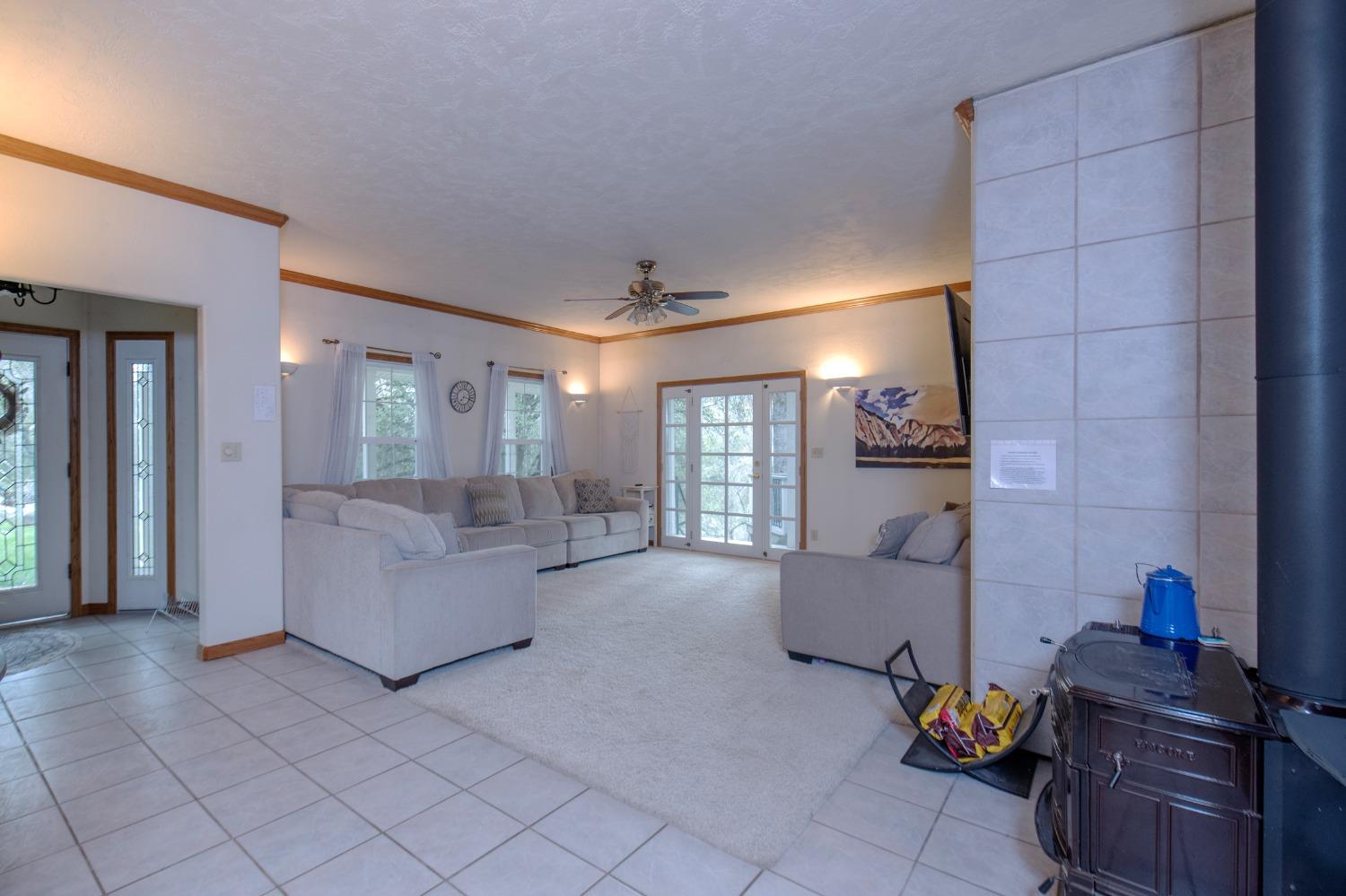 2695 Paso Pass Road Mariposa, CA 95338 - Photo 9 of 56 a living room with furniture and a window