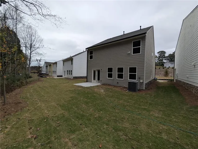 a house view with a garden space