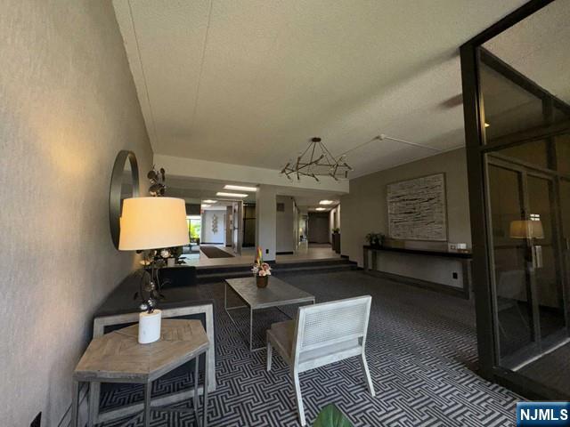 873 Main Street, Unit 3A Hackensack, NJ 07601 - Photo 3 of 15 a living room with furniture