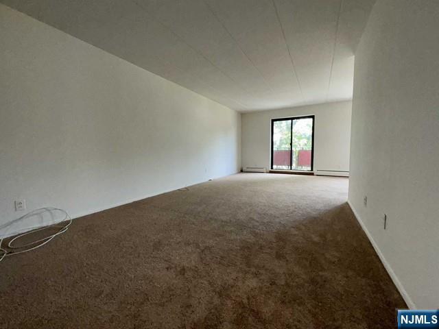 873 Main Street, Unit 3A Hackensack, NJ 07601 - Photo 4 of 15 an empty room with windows