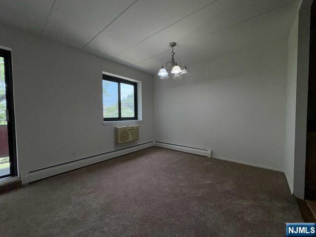 873 Main Street, Unit 3A Hackensack, NJ 07601 - Photo 5 of 15 an empty room with a window