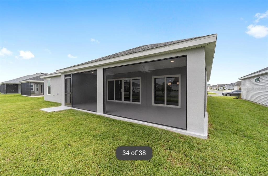 1917 Panlilio Loop The Villages, FL 34762 - Photo 11 of 11 a view of a house with a yard