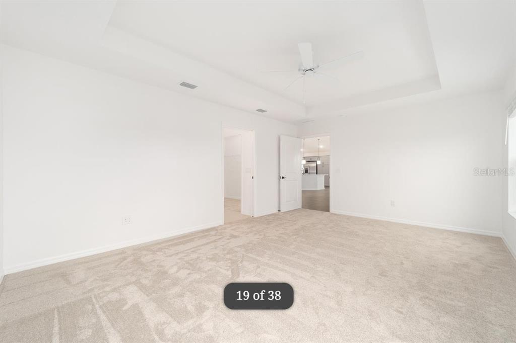 1917 Panlilio Loop The Villages, FL 34762 - Photo 6 of 11 a view of a room with a refrigerator