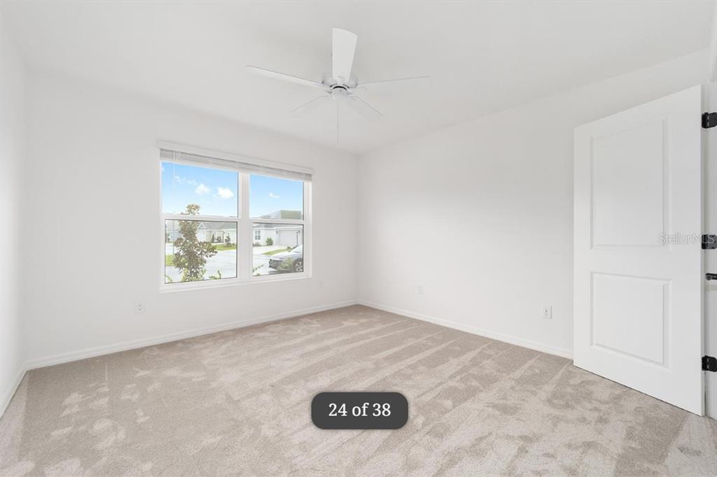 1917 Panlilio Loop The Villages, FL 34762 - Photo 7 of 11 an empty room with windows