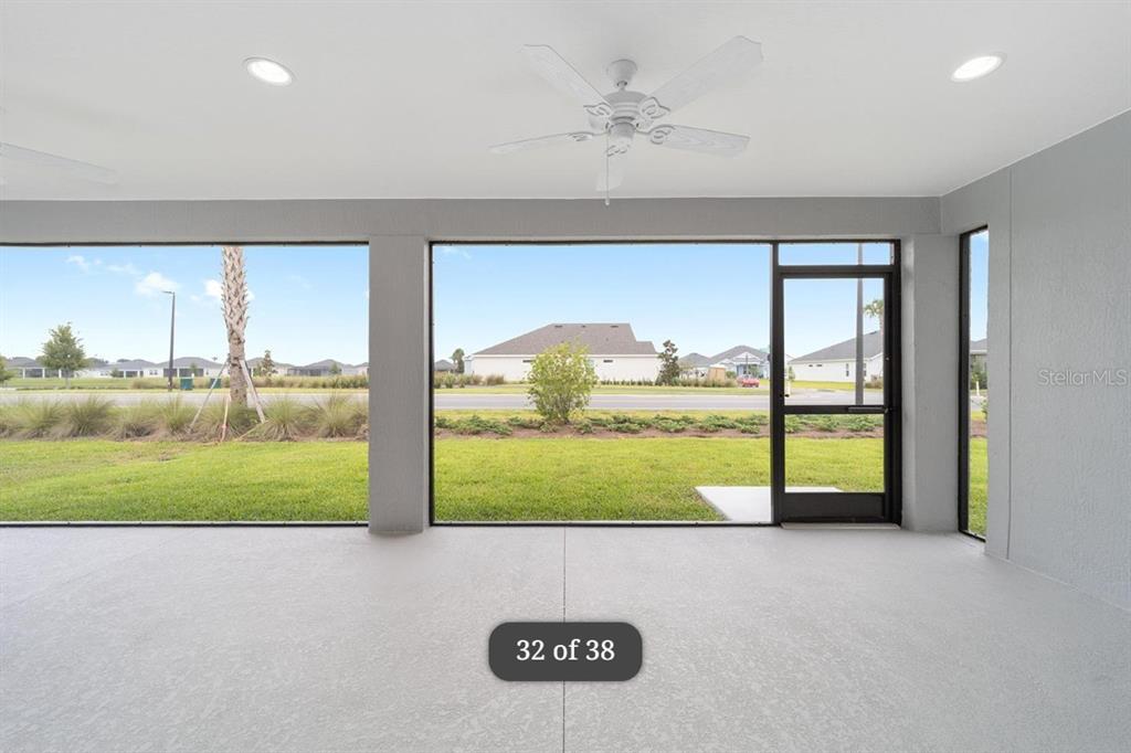 1917 Panlilio Loop The Villages, FL 34762 - Photo 10 of 11 a view of a back yard from a room