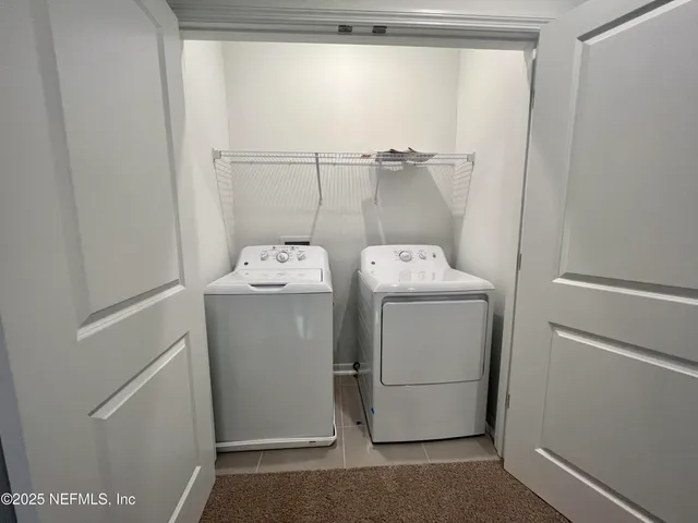 a view of a room with racks on the wall