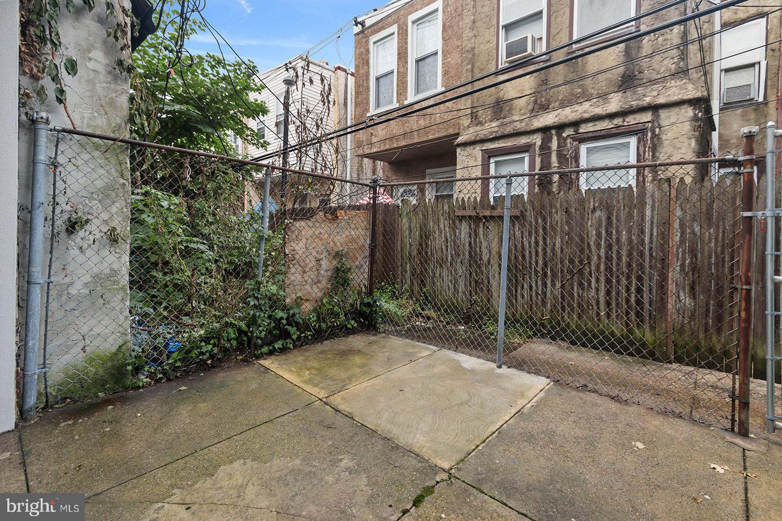 5213 Rodman Street Philadelphia, PA 19143 - Photo 30 of 31 a backyard of a building