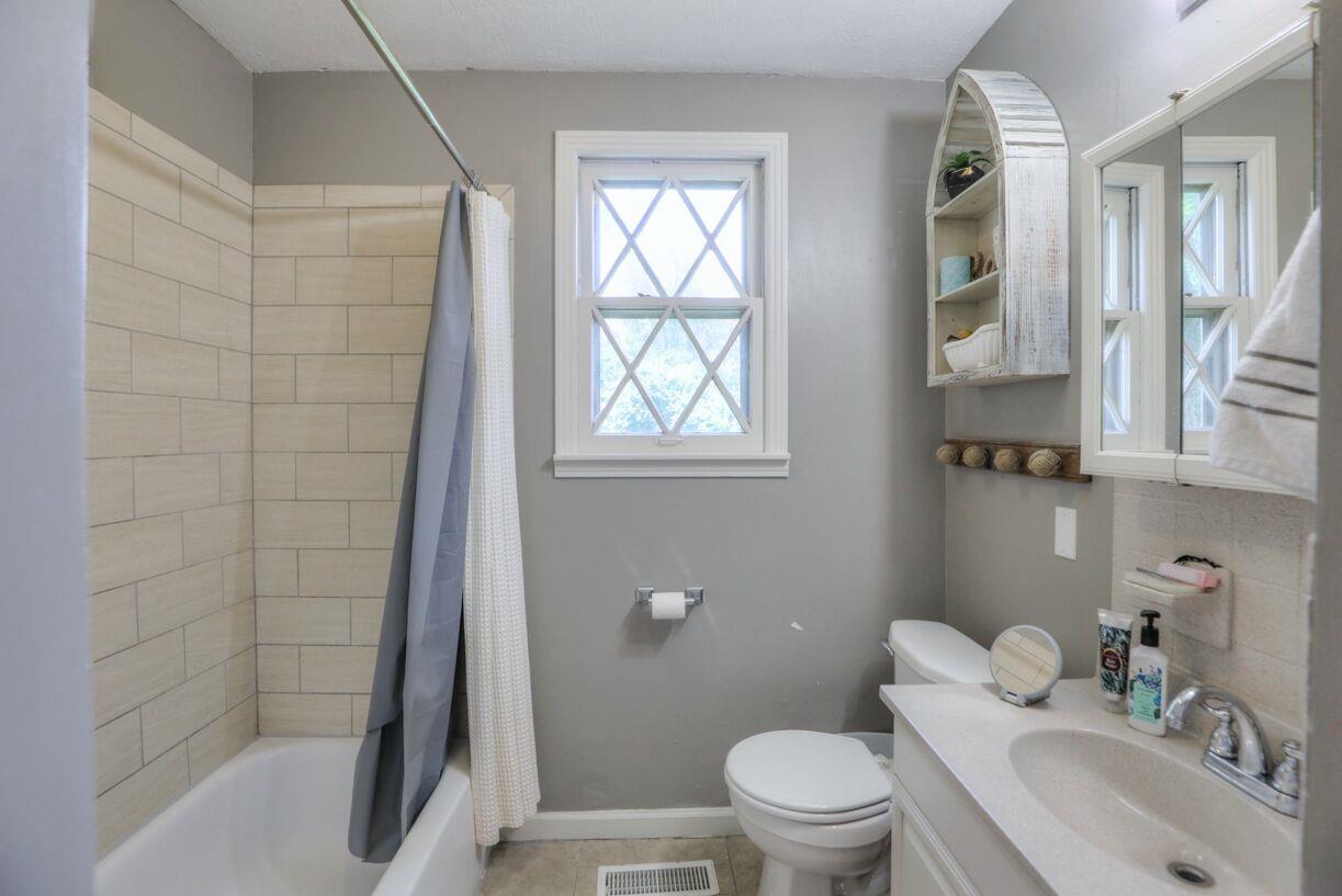 64 Searcy Road Mount Juliet, TN 37122 - Photo 12 of 16 This full bath has been done perfectly to create a tranquil space!