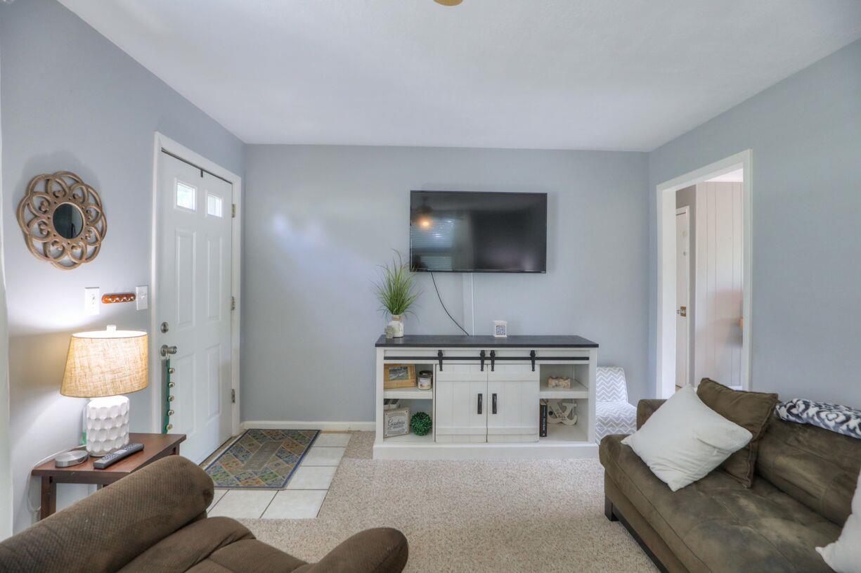 64 Searcy Road Mount Juliet, TN 37122 - Photo 3 of 16 Walk in to a spacious living room with beautiful, neutral colored paint!
