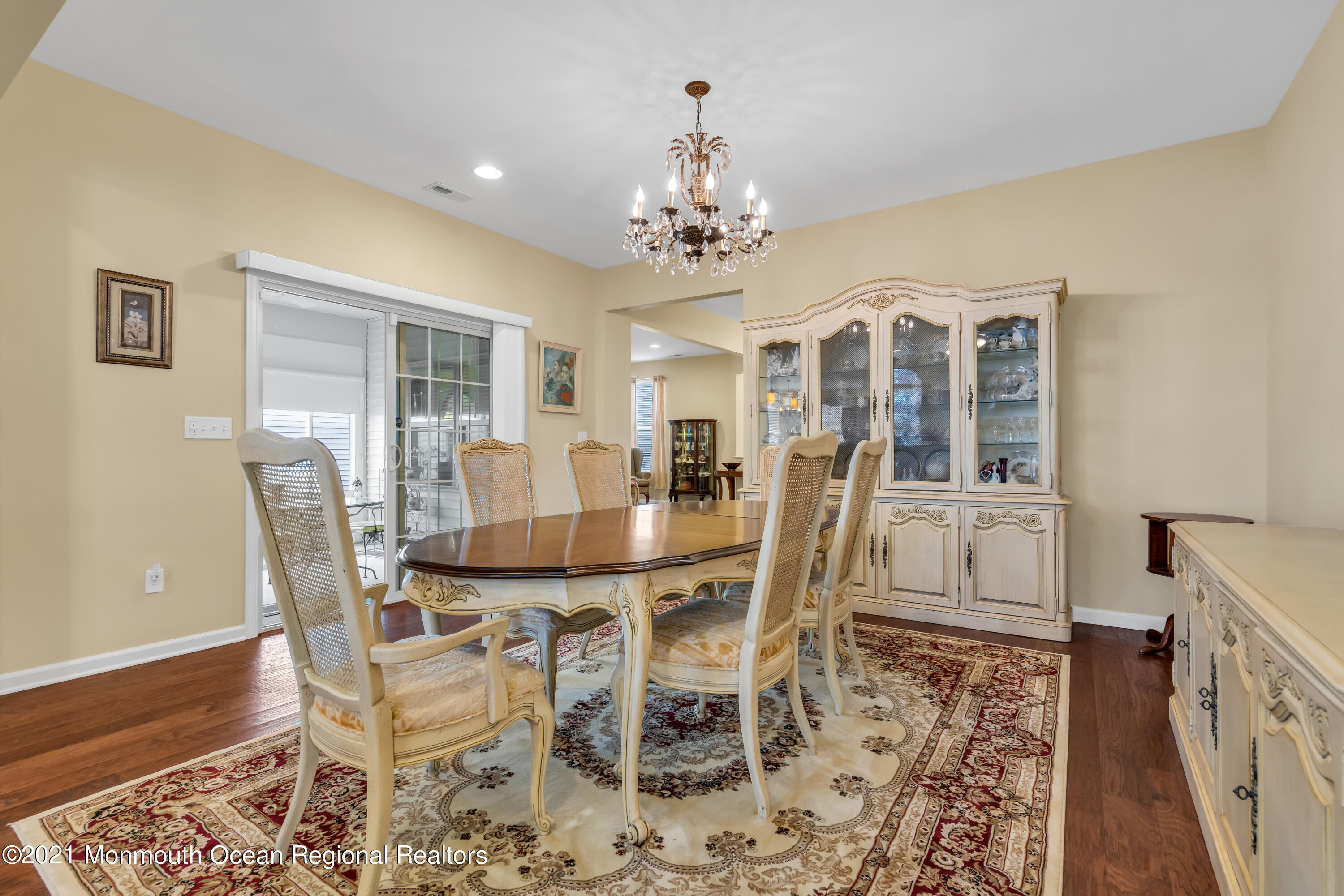 124 Heritage Point Boulevard Barnegat, NJ 08005 - Photo 12 of 56 a view of a dining room with furniture and wooden floor