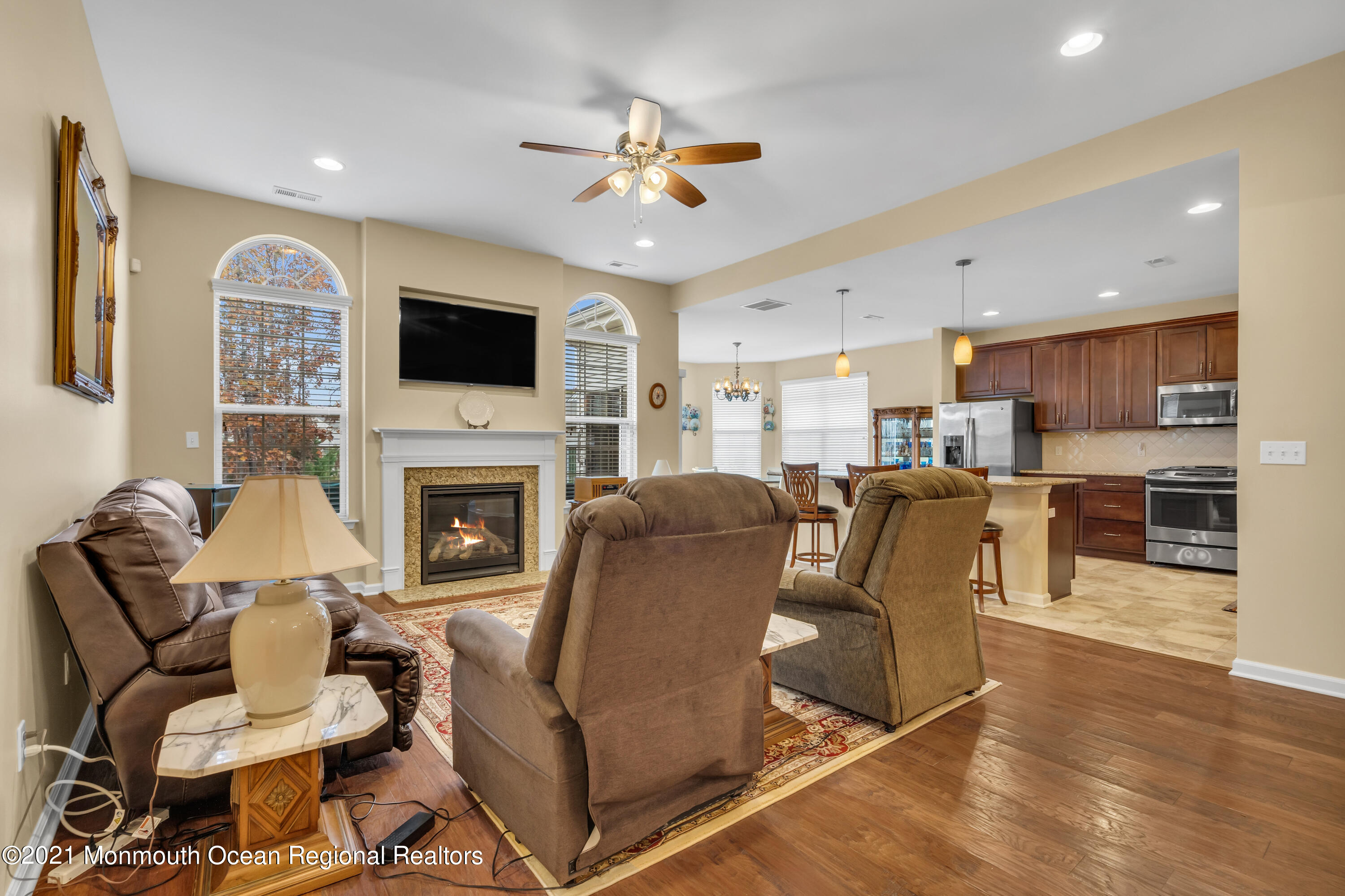 124 Heritage Point Boulevard Barnegat, NJ 08005 - Photo 31 of 56 a living room with furniture fireplace and a flat screen tv