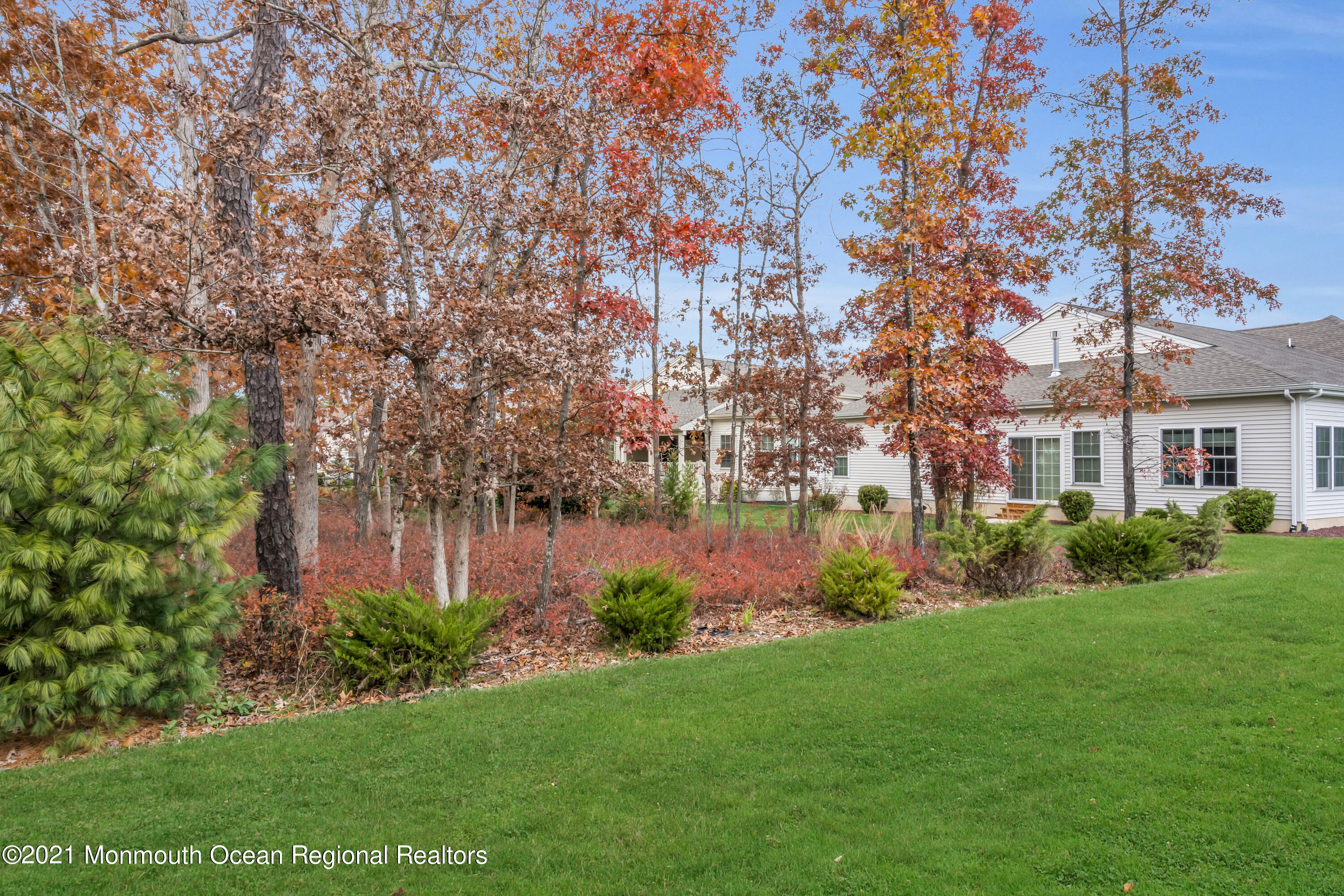 124 Heritage Point Boulevard Barnegat, NJ 08005 - Photo 42 of 56 a view of a house with a yard and a tree