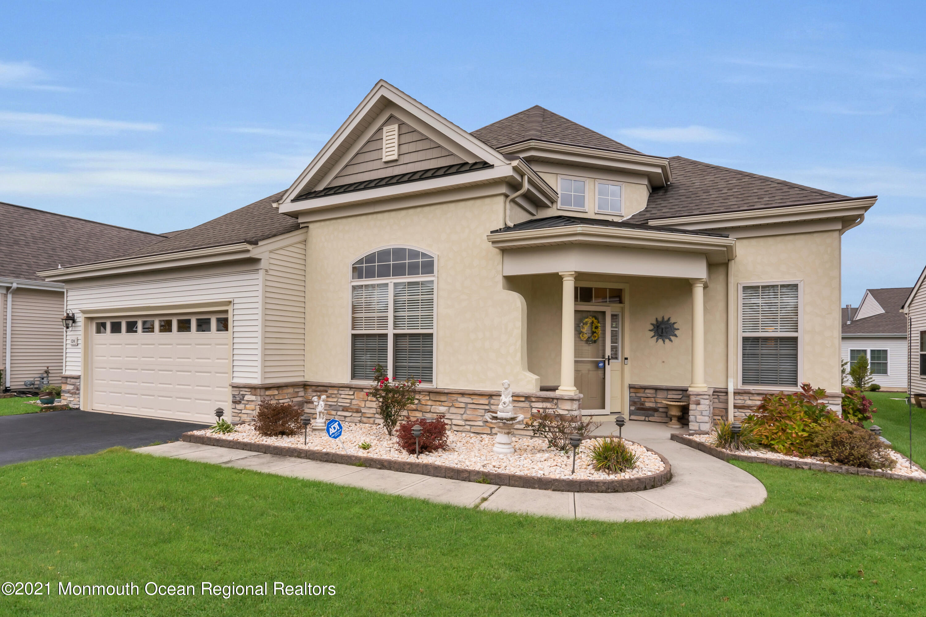 124 Heritage Point Boulevard Barnegat, NJ 08005 - Photo 49 of 56 a front view of a house with a yard