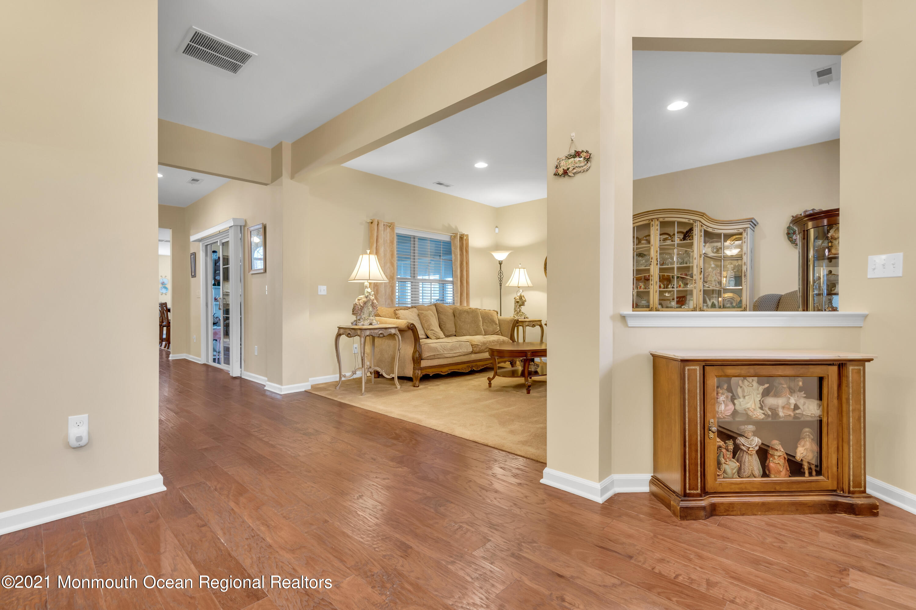 124 Heritage Point Boulevard Barnegat, NJ 08005 - Photo 6 of 56 a view of a livingroom with furniture and a hallway
