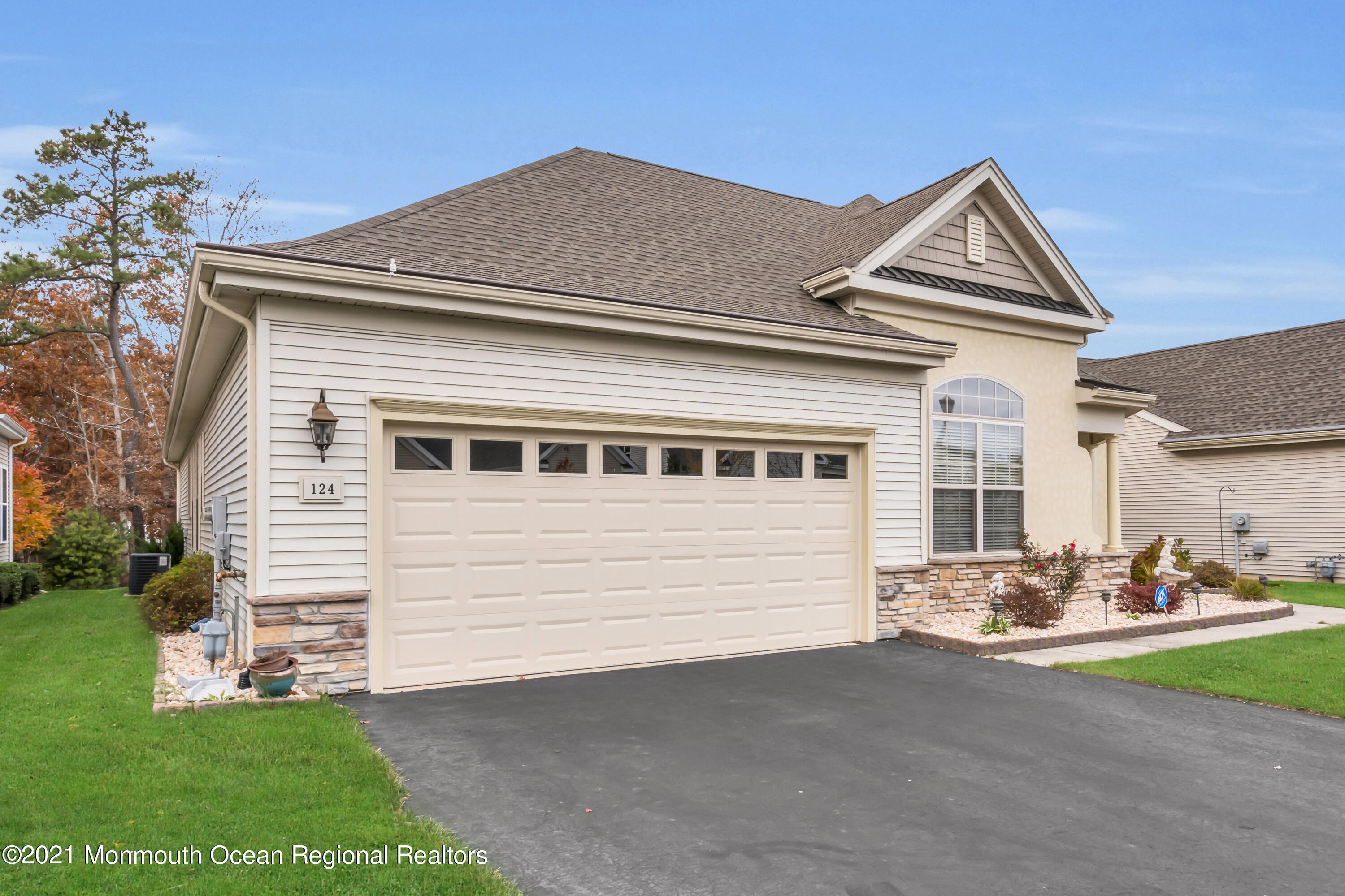 124 Heritage Point Boulevard Barnegat, NJ 08005 - Photo 53 of 56 a front view of a house with a yard