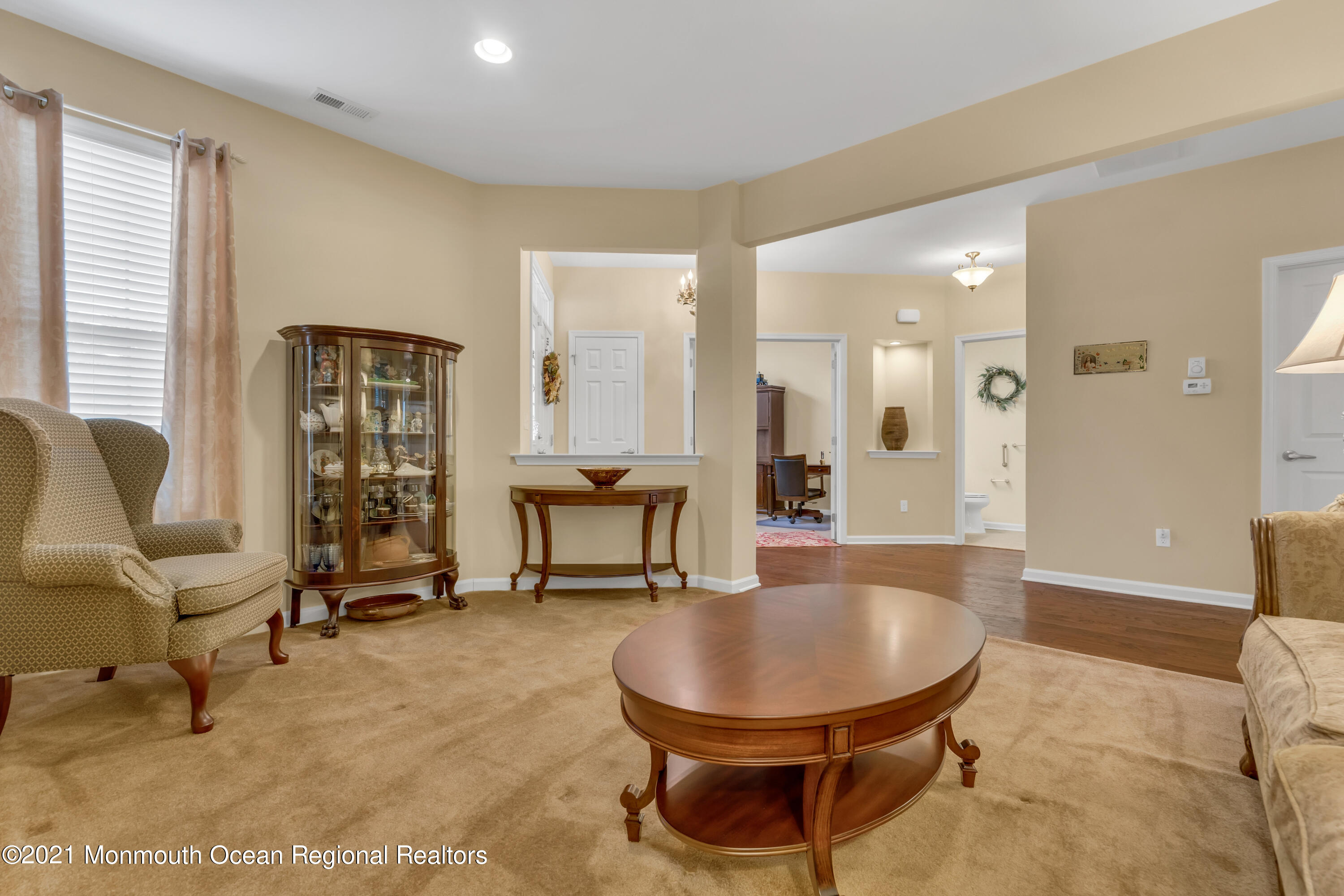 124 Heritage Point Boulevard Barnegat, NJ 08005 - Photo 8 of 56 a living room with furniture a dining table and a potted plant