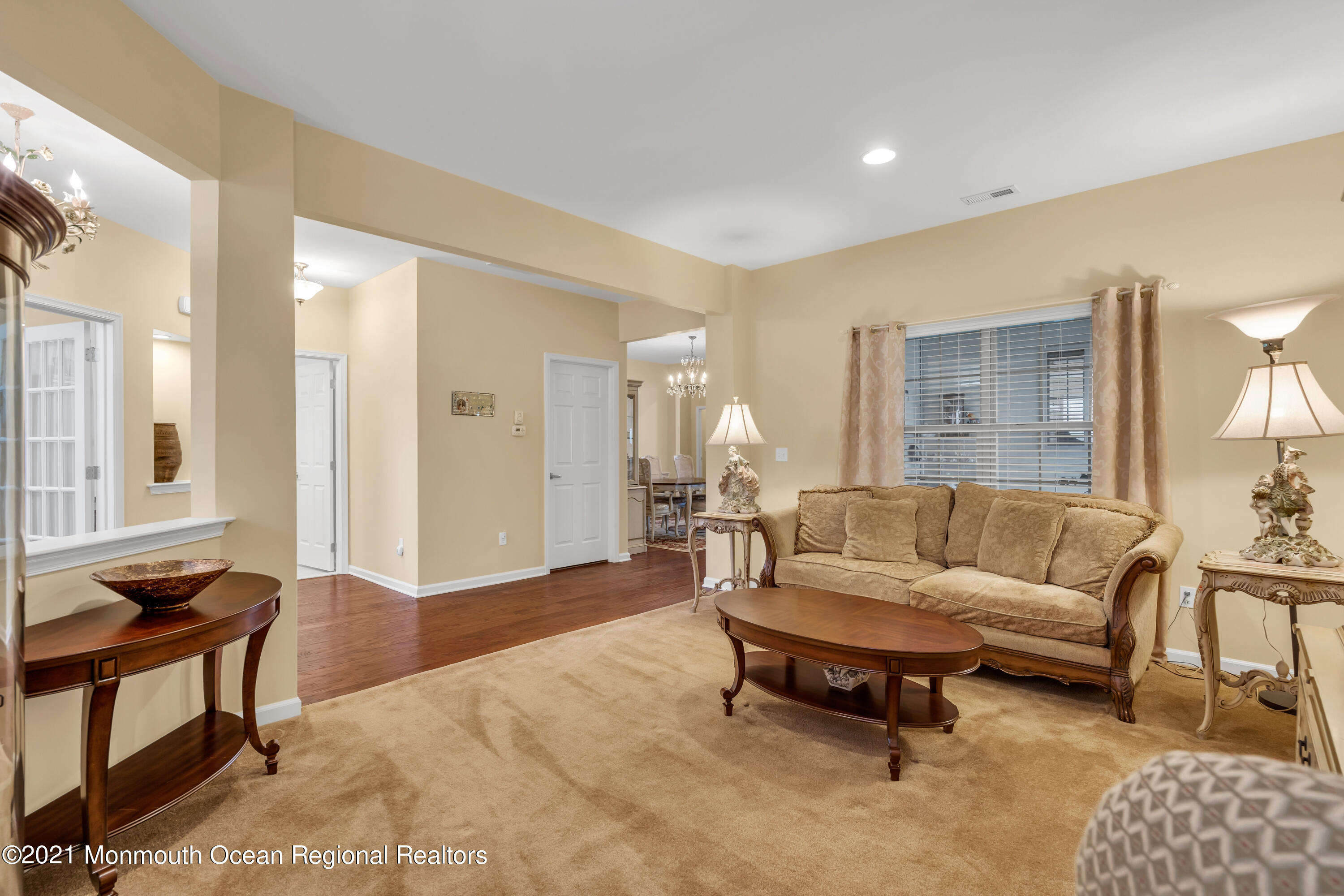 124 Heritage Point Boulevard Barnegat, NJ 08005 - Photo 9 of 56 a living room with furniture and a wooden floor