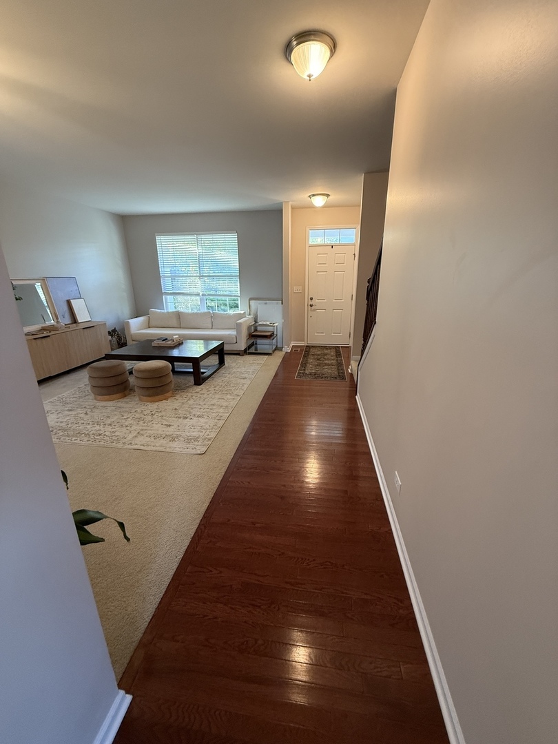 2572 Retreat Circle Lisle, IL 60532 - Photo 15 of 40 a view of living room with furniture and window